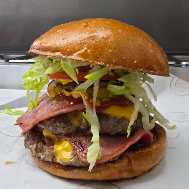 Double beef burger with bacon, cheese and salad