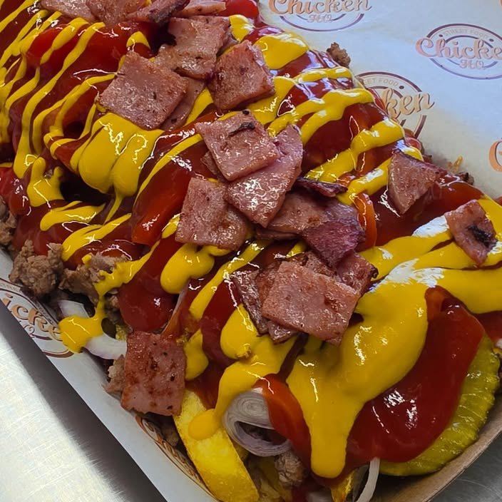 Loaded chips with bacon, ketchup and mustard
